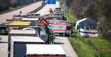 Emergency vehicles and rescue helicopters stand on the A9 highway at the scene of an accident, in Schkeuditz, near Leipzig, eastern Germany, March 27, 2024. (AFP Photo)