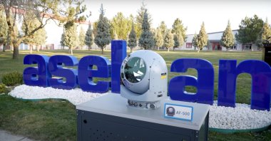 ASELFLIR-500, an electro-optical reconnaissance, surveillance, and targeting system, is seen in front of an Aselsan logo, at the company&#039;s headquarters in Ankara, Türkiye, March 27, 2024. (Aselsan via AA)
