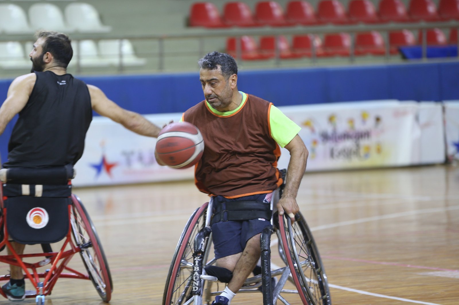 Turkish veteran wheelchair basketball player Fevzi Çakmak trains at the Tosyalı Iskenderun Disabled Sports Club, Hatay, Türkiye, March 27, 2024. (AA Photo)