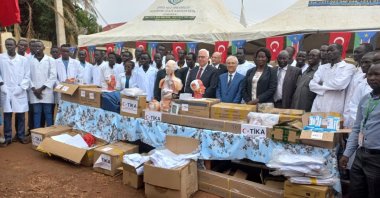Turkish officials and staff pose with South Sudanese officials and students during an aid ceremony in Malakal, South Sudan, March 27, 2024. (Courtesy of TIKA)