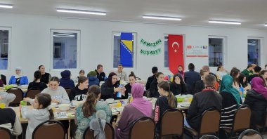 People participate in an iftar program organized by the Turkish Red Crescent (Kızılay) in Potocari, Bosnia-Herzegovina, March 27, 2024. (AA Photo)
