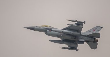 A Turkish Air Force F-16 military fighter jet flies at the end of an Air Policing exercise above eastern Romania, Wednesday, March 6, 2024. (AP Photo/Andreea Alexandru)