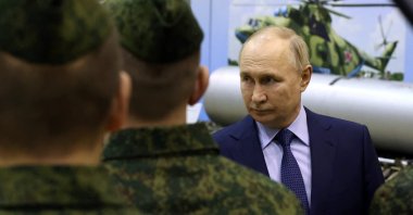 Russian President Vladimir Putin talks to military pilots at the 344th State Center for combat use and retraining of flight crews of the Russian Defense Ministry in the town of Torzhok in the Tver Region, Russia, March 27, 2024. (Reuters Photo)