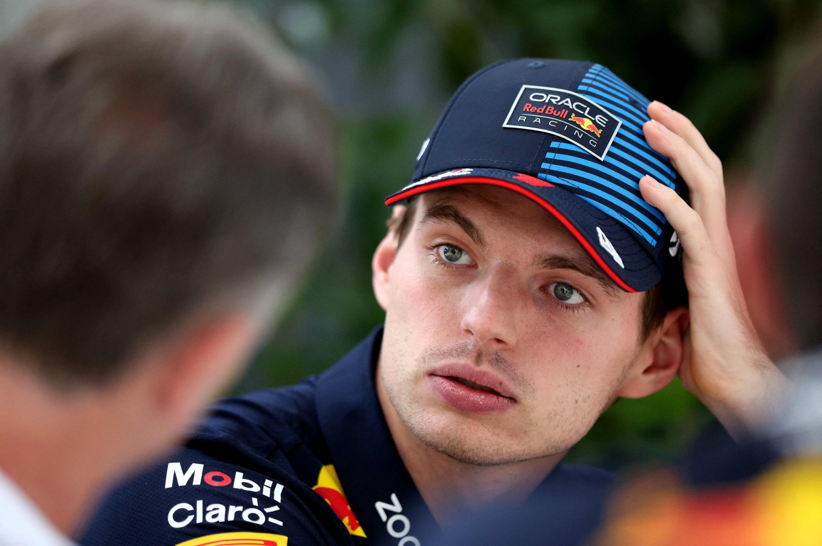 Red Bull Racing&#039;s Dutch driver Max Verstappen (R) talks to Red Bull Racing team principal Christian Horner at the Albert Park Circuit ahead of the Formula One Australian Grand Prix, Melbourne, Australia, March 21, 2024. (AFP Photo)