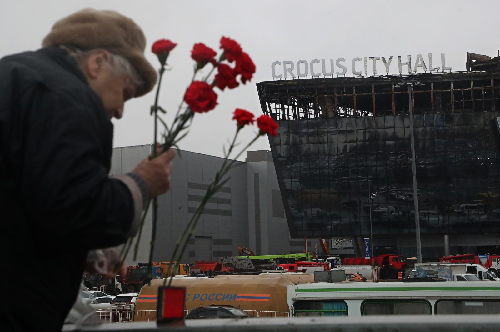 People mourn and bring flowers at the Crocus City Hall concert venue following a terrorist attack in Krasnogorsk, outside Moscow, Russia, March 24, 2024. (EPA Photo)