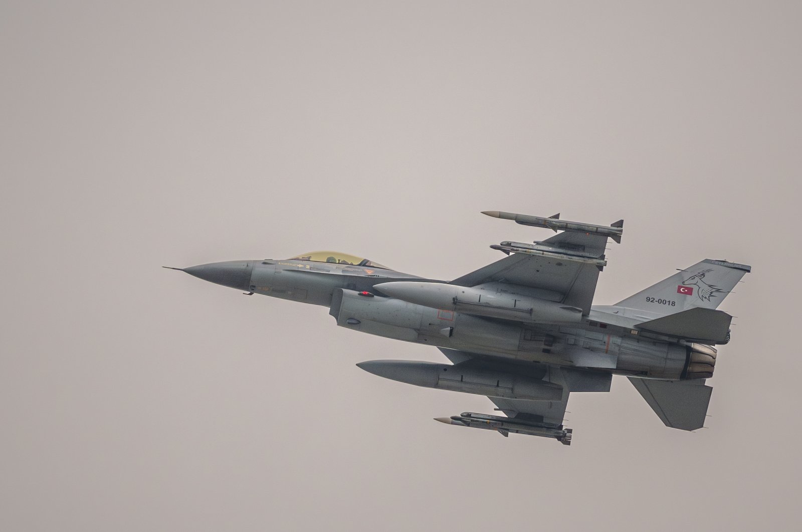 A Turkish Air Force F-16 military fighter jet flies at the end of an Air Policing exercise above eastern Romania, Wednesday, March 6, 2024. (AP Photo/Andreea Alexandru)