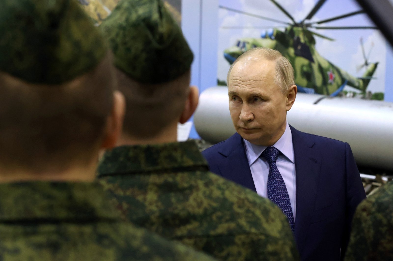 Russian President Vladimir Putin talks to military pilots at the 344th State Center for combat use and retraining of flight crews of the Russian Defense Ministry in the town of Torzhok in the Tver Region, Russia, March 27, 2024. (Reuters Photo)
