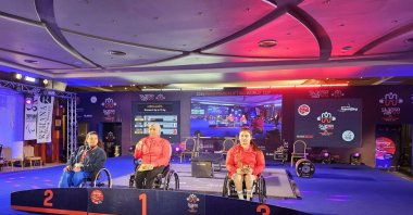 Turkish weightlifter Sibel Çam (R) on the podium during the Para Powerlifting World Cup, Sharm El Sheikh, Egypt, March 23, 2024. (AA Photo)
