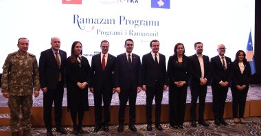 Officials and other dignitaries from both the countries pose after iftar dinner held at Pristina, Kosovo, March 28, 2024. (AA Photo)