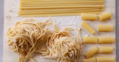 Spaghetti, rigatoni, and handmade fettuccine are displayed at a restaurant in Rome, Italy, March 25, 2024. (Reuters Photo)