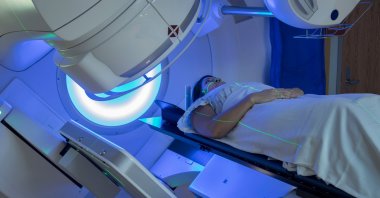 Woman undergoing radiation therapy for breast cancer. (Shutterstock Photo)