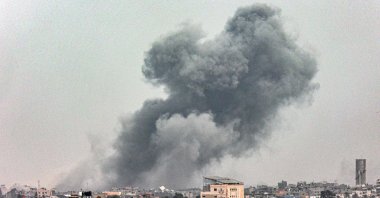 A smoke plume erupts during Israeli bombardment on Khan Yunis as seen from Rafah, Gaza Strip, Palestine, March 29, 2024. (AFP Photo)
