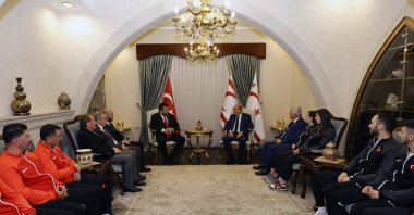 Turkish Republic of Northern Cyprus&#039; President Ersin Tatar (R) speaks with the Turkish Karate Federation President, Aslan Abid Uğuz, Lefkoşa (Nicosia), TRNC, March 25, 2024. (AA Photo)