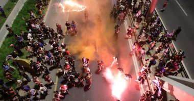 Anti-government protesters block a main road during a rally against the Israeli prime minister, outside the Knesset, the Israeli parliament, west Jerusalem, Israel. March, 31, 2024. (EPA Photo)