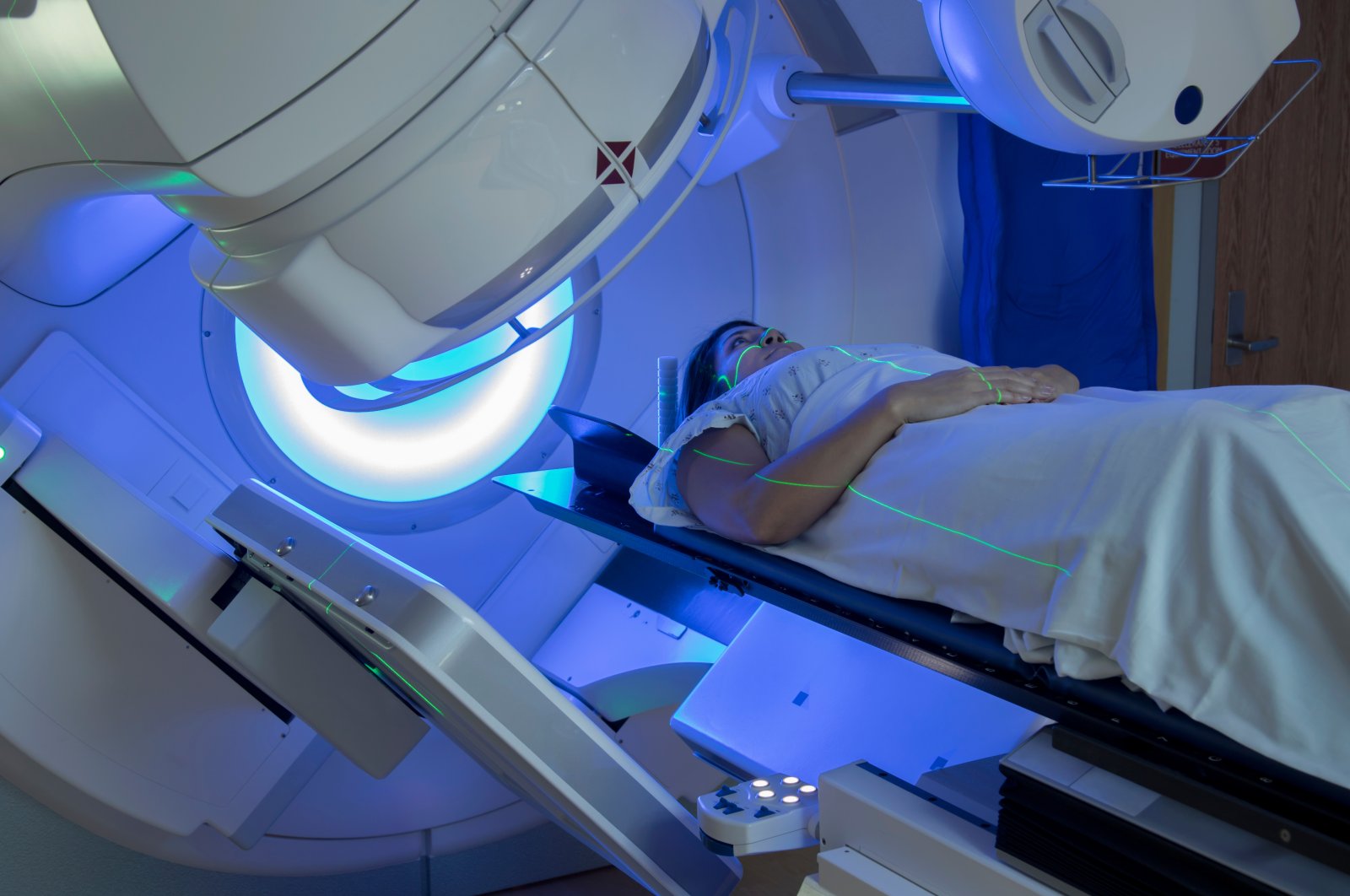 Woman undergoing radiation therapy for breast cancer. (Shutterstock Photo)