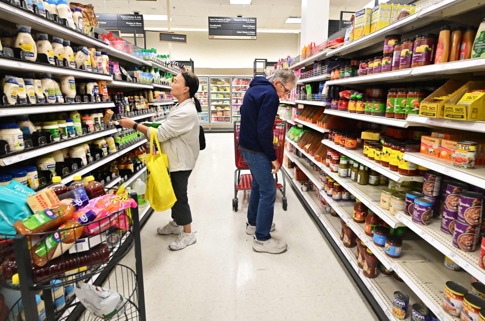 People shop in the food section of a retail store in Rosemead, California, U.S., on Jan. 19, 2024. (AFP Photo)