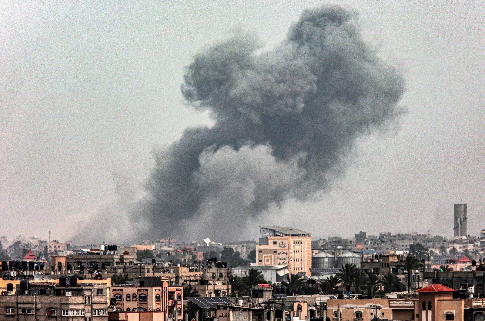 A smoke plume erupts during Israeli bombardment on Khan Yunis as seen from Rafah, Gaza Strip, Palestine, March 29, 2024. (AFP Photo)