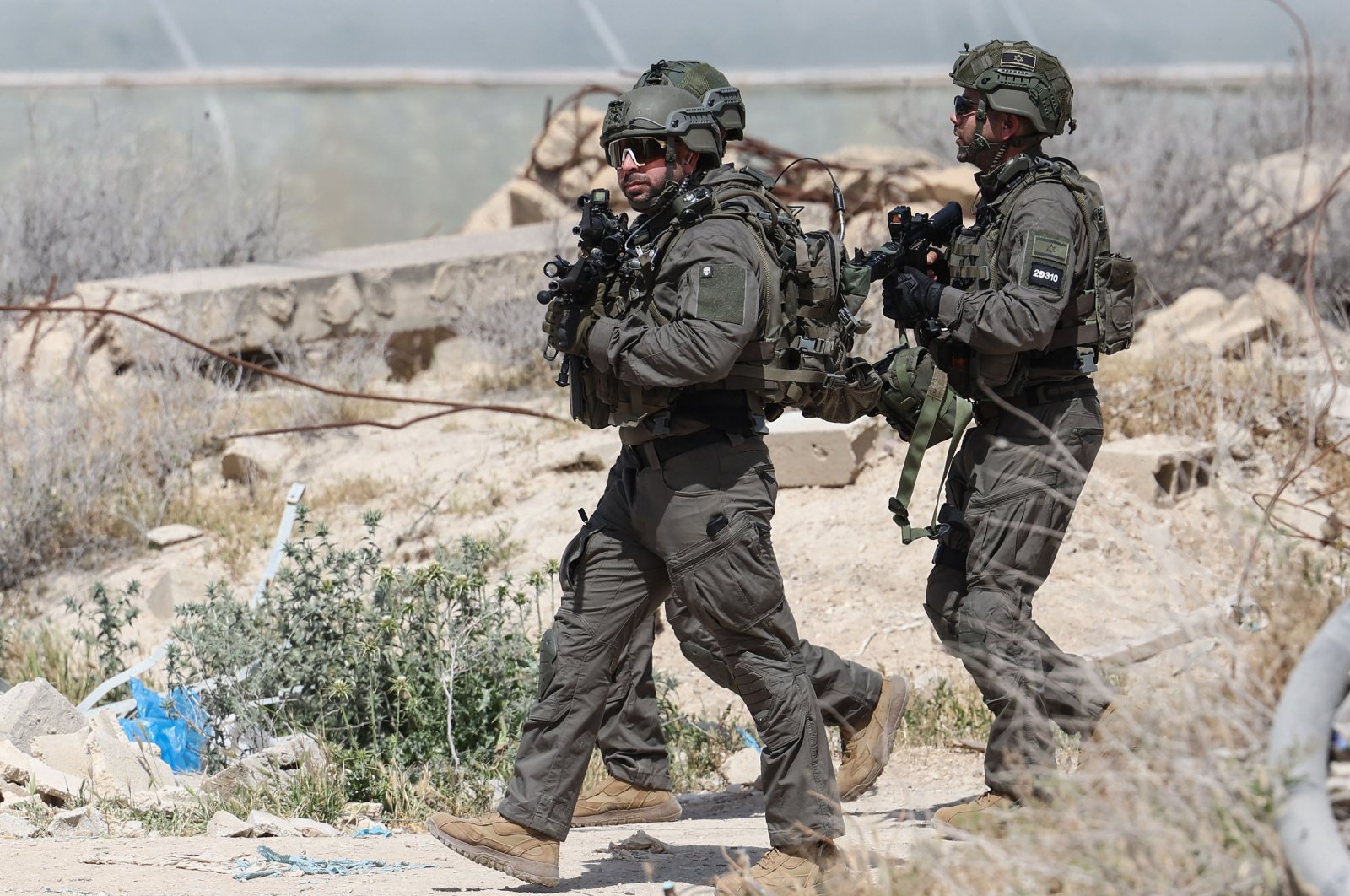 Israeli security forces inspect the site of a shooting attack in Al-Awja in the occupied West Bank, Palestine, March 28, 2024. (AFP Photo)
