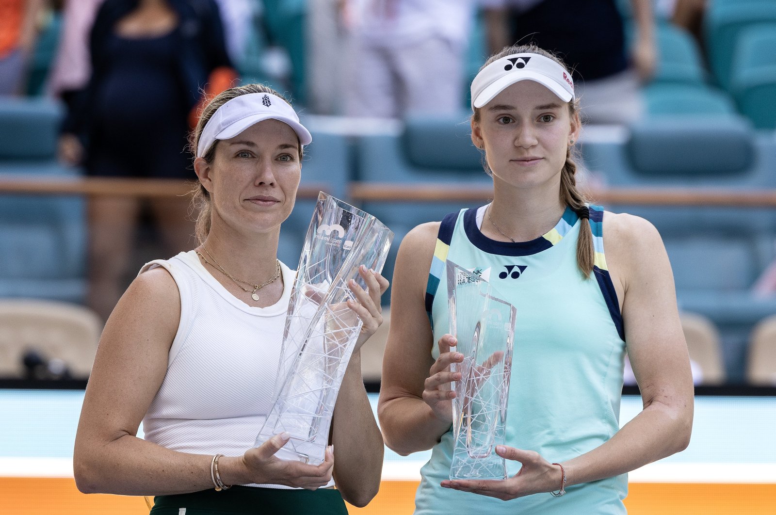 Danielle Collins (L) and Elena Rybakina pose with their trophies after the women&#039;s final match of the 2024 Miami Open tennis tournament, Miami, Florida, U.S., March 30, 2024. (EPA Photo)
