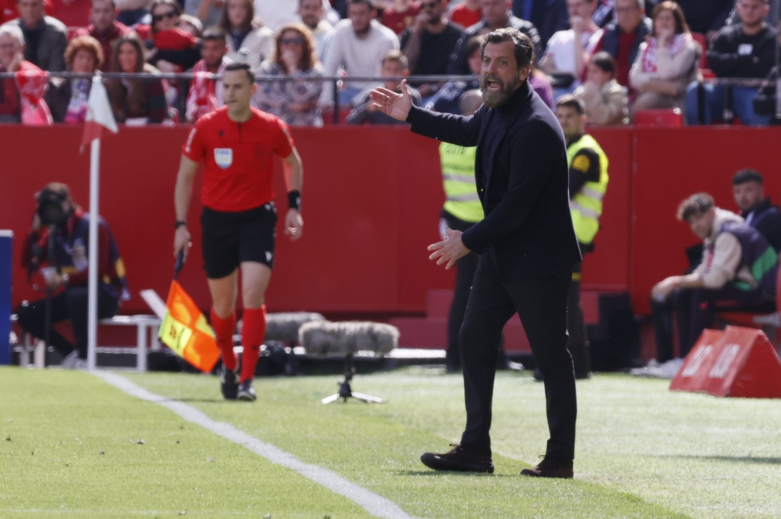 Sevilla&#039;s head coach, Quique Sanchez Flores, gestures during the Spanish La Liga match against Real Sociedad, Seville, Spain, March 2, 2024. (EPA Photo)