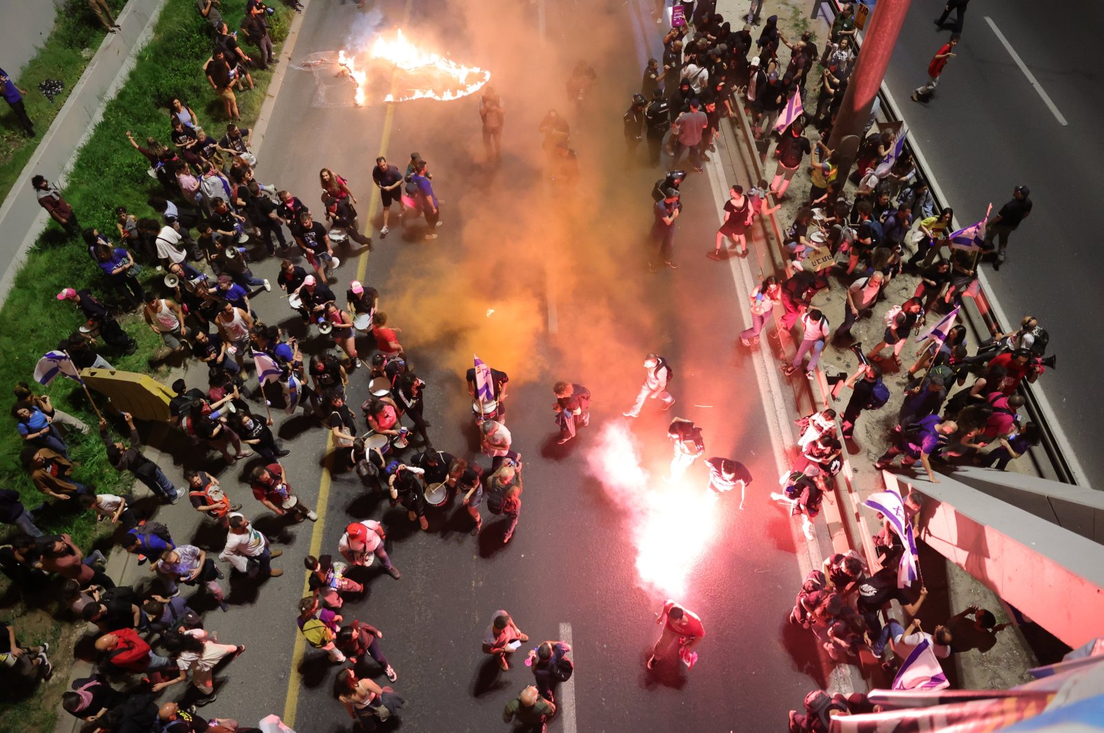 Anti-government protesters block a main road during a rally against the Israeli prime minister, outside the Knesset, the Israeli parliament, west Jerusalem, Israel. March, 31, 2024. (EPA Photo)