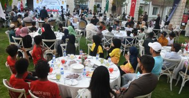 People attend an iftar program organized by the Turkish Cooperation and Coordination Agency (TIKA) in Karachi, Pakistan, March 31, 2024. (Courtesy of TIKA)
