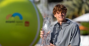 Jannik Sinner poses with the Miami Open men&#039;s trophy at Hard Rock Stadium, Miami Gardens, Florida, U.S., March 31, 2024. (AFP Photo)