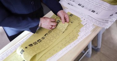 An official prepares ballot papers for the local elections, Istanbul, Türkiye, March 31, 2024. (EPA Photo)