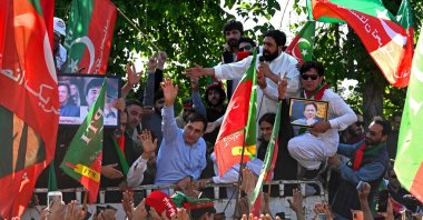 Pakistan Tehreek-e-Insaf (PTI) supporters take part in a protest rally for the release of Imran Khan, in Peshawar, Pakistan, March 31, 2024. (AFP Photo)