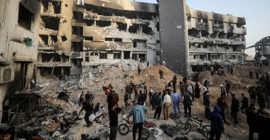 Palestinians inspect damages at Al-Shifa Hospital after Israeli forces withdrew from the hospital and the area around it following a two-week operation, in Gaza City April 1, 2024. (Reuters Photo)