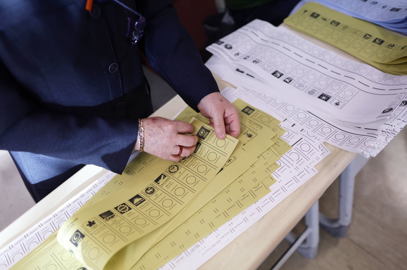 An official prepares ballot papers for the local elections, Istanbul, Türkiye, March 31, 2024. (EPA Photo)