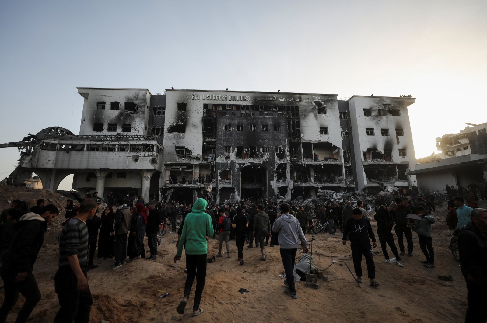 Palestinians inspect damages at Al-Shifa Hospital after Israeli forces withdrew following a two-week operation, in Gaza City, Palestine, April 1, 2024. (Reuters Photo)