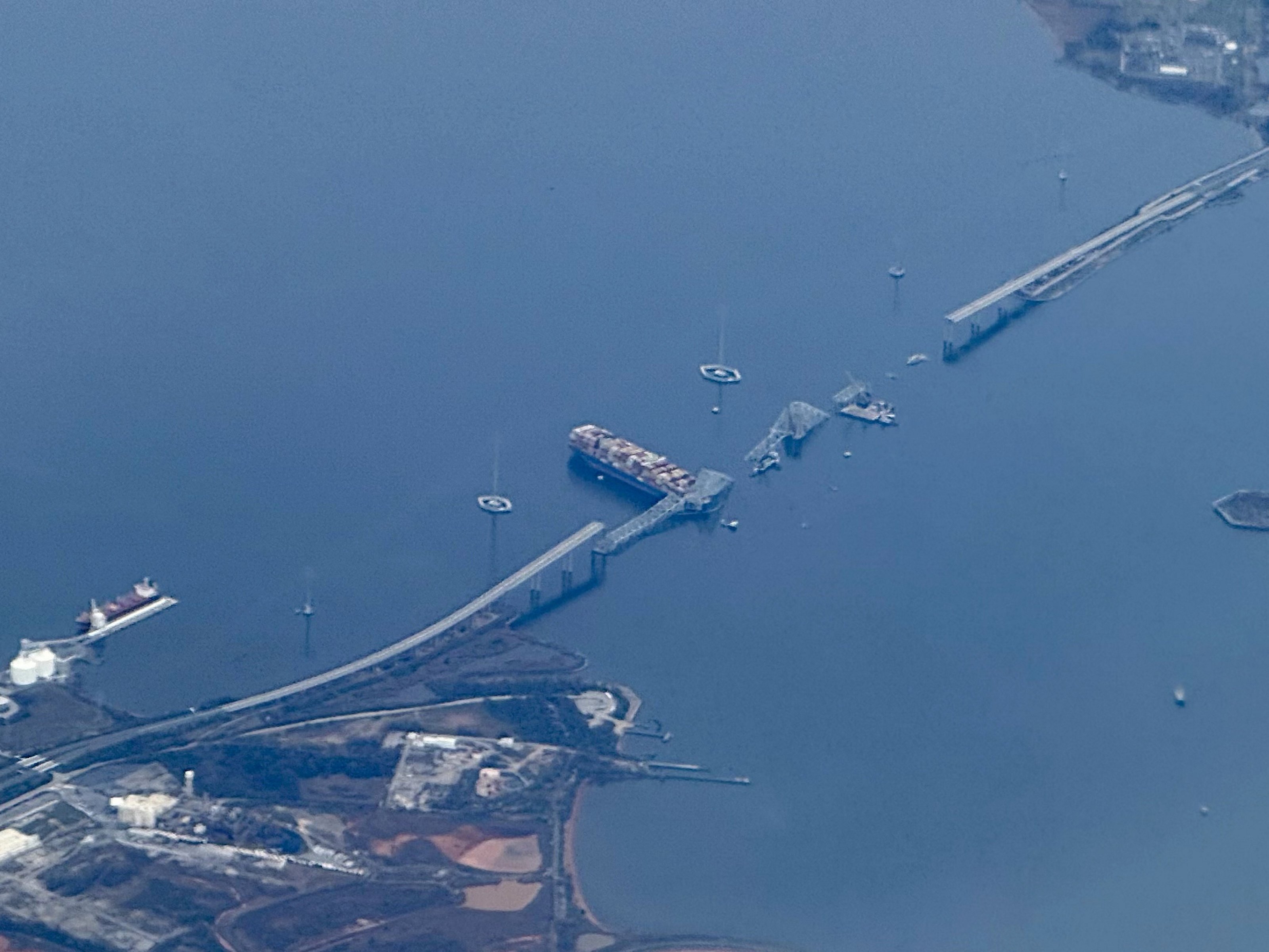 The collapsed Francis Scott Key Bridge lying on top of the container ship Dali in Baltimore, Maryland, on March 31, 2024. (AFP Photo)