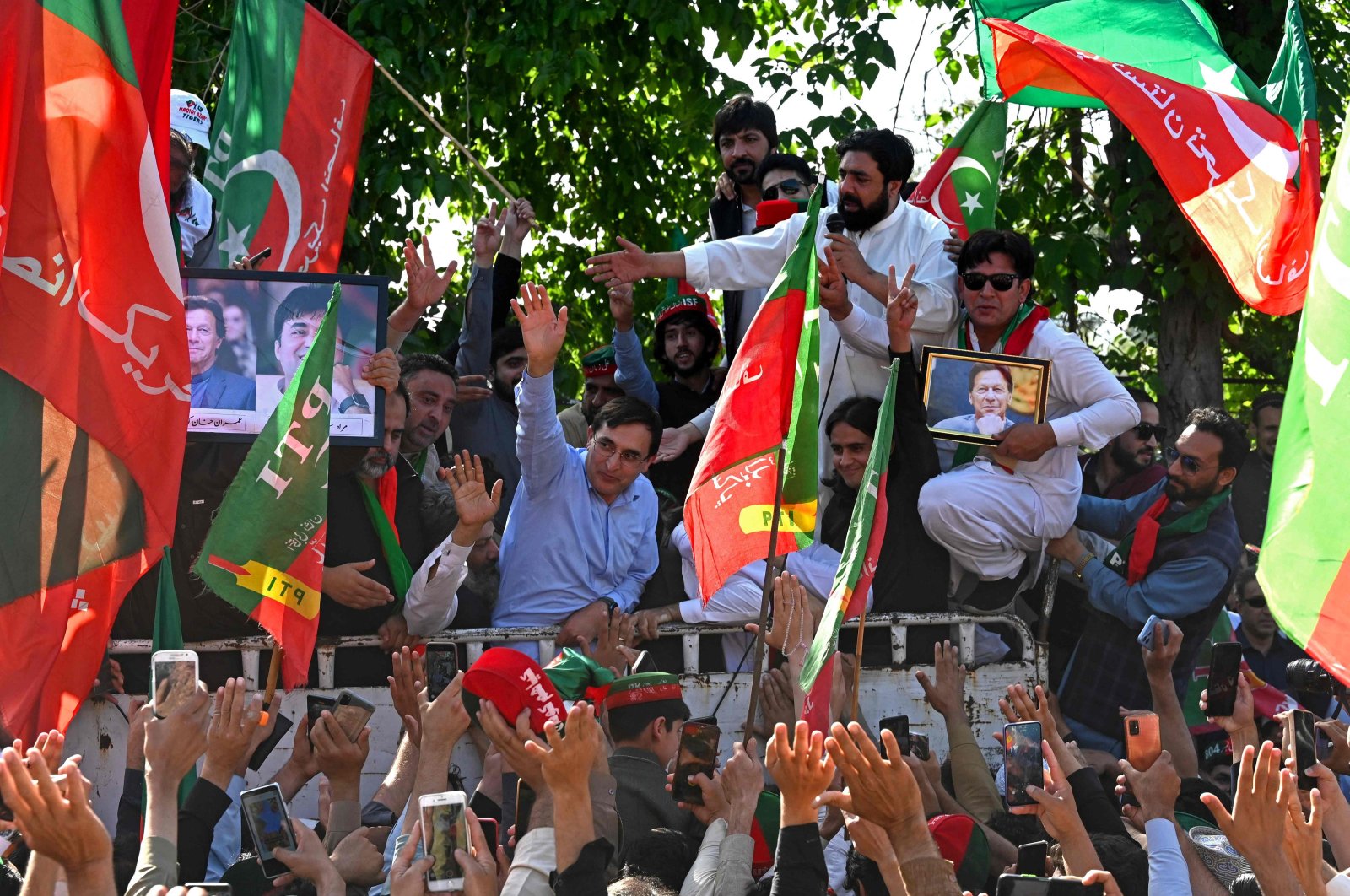 Pakistan Tehreek-e-Insaf (PTI) supporters take part in a protest rally for the release of Imran Khan, in Peshawar, Pakistan, March 31, 2024. (AFP Photo)