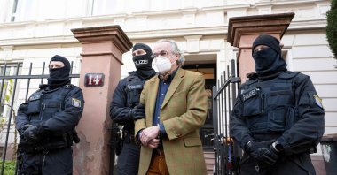 German police special forces detain Heinrich XIII Prinz Reuss after searching a house, Frankfurt am Main, Germany, Dec. 7, 2022. (AFP Photo)