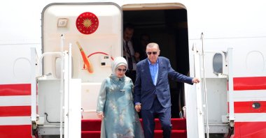 President Recep Tayyip Erdoğan (R) and first lady Emine Erdoğan disembark from a plane in Bali, Indonesia, Nov. 14, 2022. (Reuters Photo)