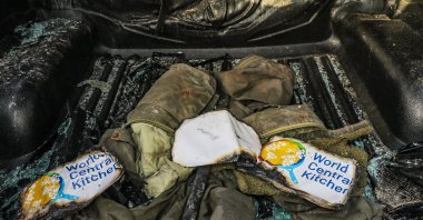 Clothes of members of the NGO World Central Kitchen (WCK) are seen inside their destroyed car along Al Rashid road, between Deir Al Balah and Khan Younis, Gaza Strip, Palestine, April 2, 2024. (EPA Photo)