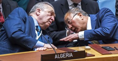 Permanent Representative of Algeria to the United Nations Amar Bendjama (L) talks to China&#039;s ambassador to the U.N., Zhang Jun, after voting against a U.S. ceasefire resolution for the Gaza war during a U.N. Security Council meeting at the U.N. headquarters, in New York City, U.S., March 22, 2024. (AFP Photo)