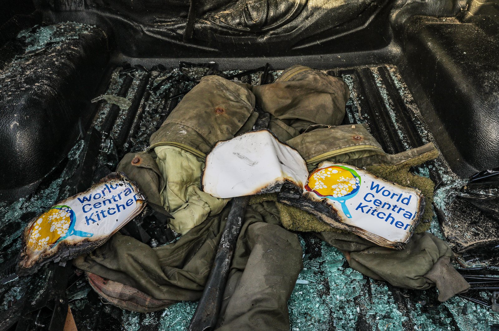 Clothes of members of the NGO World Central Kitchen (WCK) are seen inside their destroyed car along Al Rashid road, between Deir Al Balah and Khan Younis, Gaza Strip, Palestine, April 2, 2024. (EPA Photo)