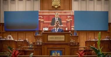 Romanian Prime Minister-designate Marcel Ciolacu, the leader of the Social Democratic Party (PSD), delivers a speech before a confidence vote for him and his team at Parliament, Bucharest, Romania, June 15, 2023. (AP Photo)