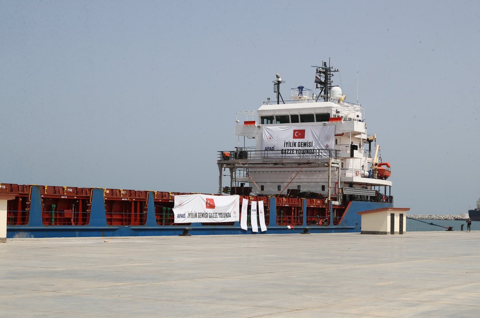 The eighth ship carrying humanitarian aid for Gaza sent by Türkiye reaches the Al-Arish port, Egypt, March 30, 2024. (AA Photo)