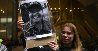Pro-Palestinian demonstrators hold up the photo of a WCK aid worker killed by Israel in Gaza, Sydney, Australia, April 4, 2024. (EPA Photo)