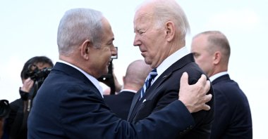 Israel Prime Minister Benjamin Netanyahu (L) greets U.S. President Joe Biden upon his arrival at Tel Aviv's Ben Gurion Airport, Israel, Oct. 18, 2023. (AFP Photo)
