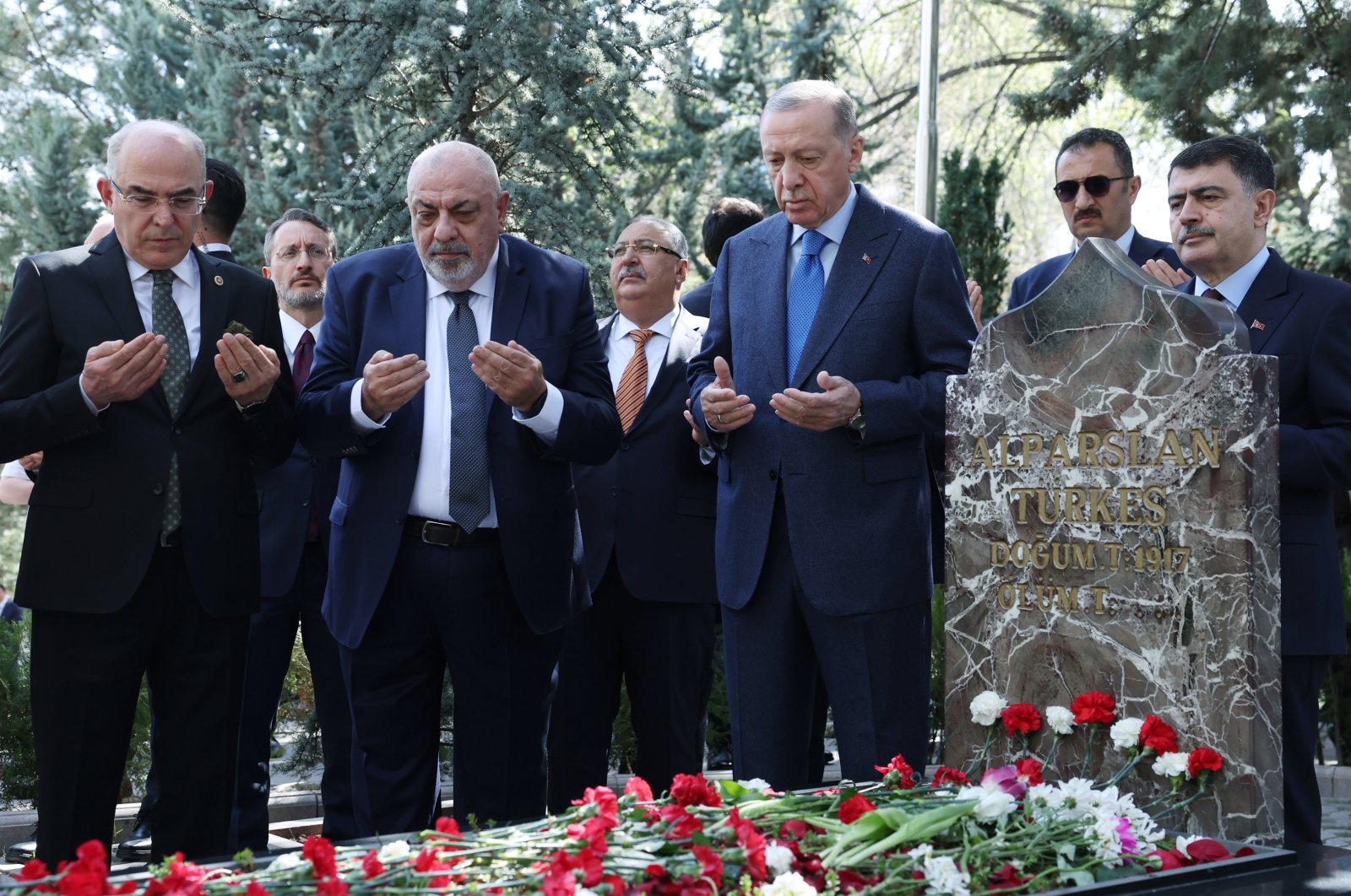 President Recep Tayyip Erdoğan (2nd R) and Alparslan Türkeş&#039;s son Yıldırım Tuğrul Türkeş pray by the grave of Alparslan Türkeş, Ankara, Türkiye, April 4, 2024. (AA Photo)