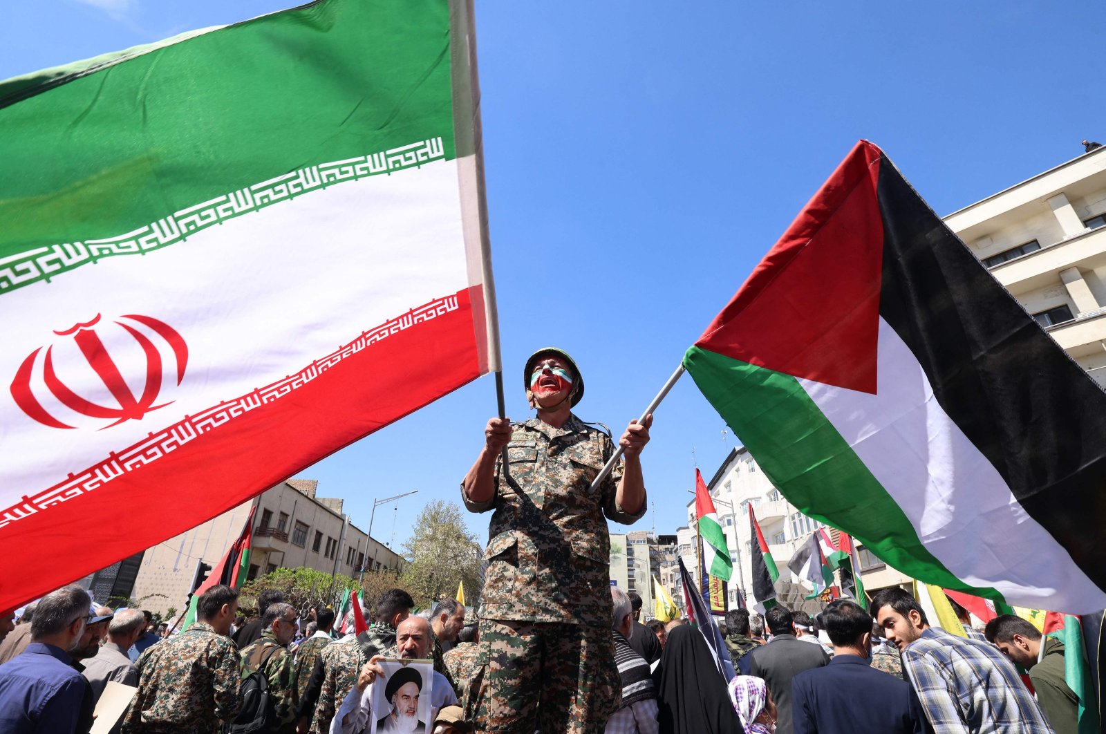 Iranians attend the annual Quds (Jerusalem) Day commemorations and the funeral of seven Revolutionary Guard Corps members killed in the Israeli strike on the country&#039;s consular annex in Damascus, Tehran, Iran, April 5, 2024. (AFP Photo)