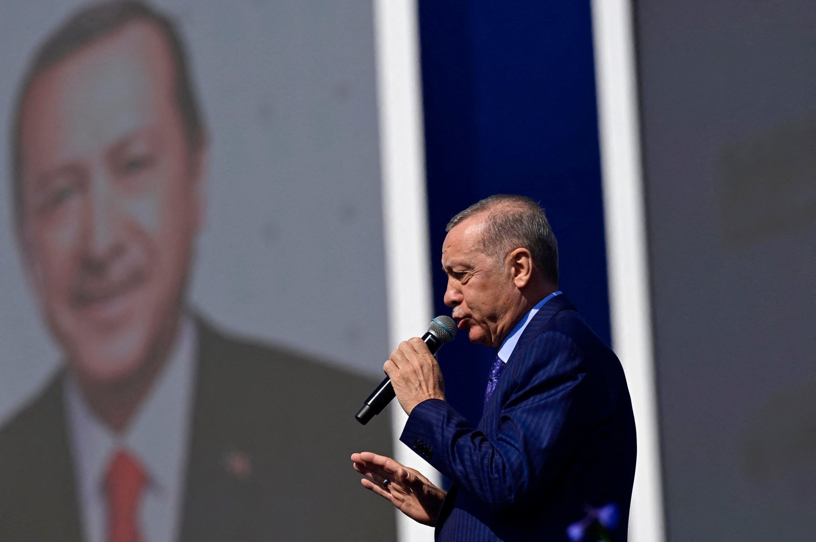 President Recep Tayyip Erdoğan addresses supporters during an election campaign rally in Istanbul, Türkiye, March 24, 2024. (AFP Photo)