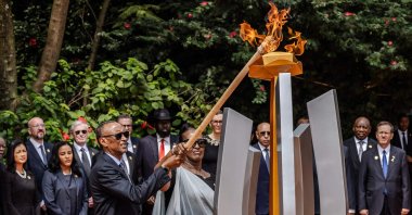 President of Rwanda Paul Kagame (C L) and his wife Jeannette Kagame (C R) light a remembrance flame as part of the commemorations of the 30th Anniversary of the 1994 Rwandan genocide at the Kigali Genocide Memorial, Kigali, Rwanda, April 7, 2024. (AFP Photo)