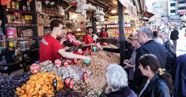 People buy dried nuts and fruits in the famous Eminönü neighborhood, Istanbul, Türkiye, April 6, 2024. (AA Photo)
