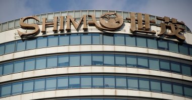 The logo of property developer Shimao Group is seen on the facade of Shimao Tower in Shanghai, China, Jan. 13, 2022. (Reuters Photo)