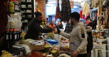 People shop at the Uzun Çarşı ("Long Bazaar") in Hatay, southern Türkiye, April 8, 2024. (AA Photo)